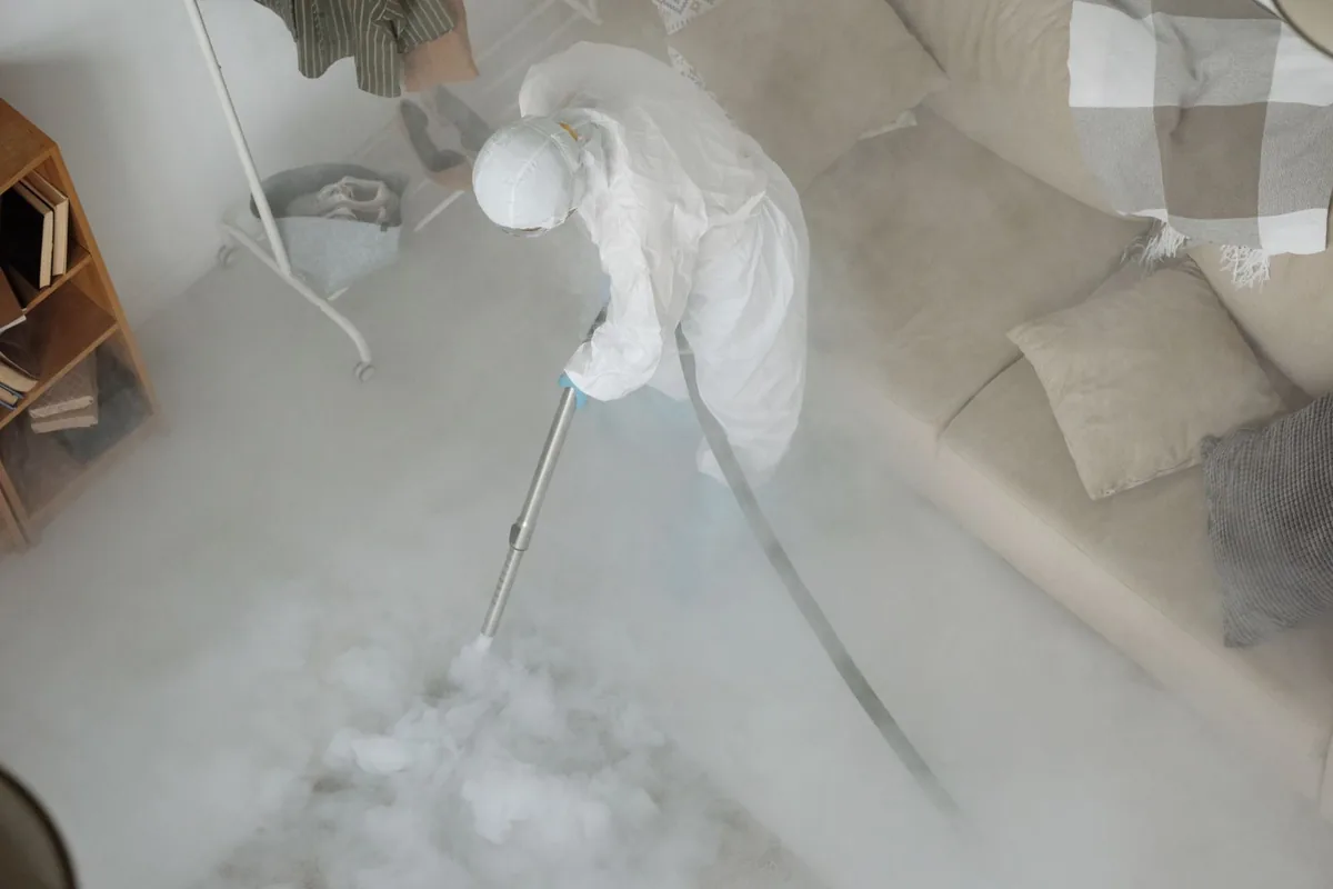 Biohazard cleanup technician in protective equipment, Egypt, PA